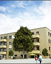 Wohnhausanlage mit Menschen und Bäumen