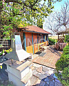 Grill Terrasse mit Blick zur Weinlaube