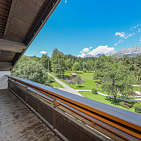 KITZIMMO-Dachgeschosswohnung in Ruhelage mit Kaiserblick kaufen - Immobilien Oberndorf.