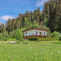 KITZIMMO-Mehrfamilienhaus in Alleinlage kaufen - Immobilien Oberndorf in Tirol.