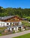 KITZIMMO-Luxus-Apartmenthaus in einzigartiger Top-Sonnenlage kaufen - Immobilien Hollersbach.